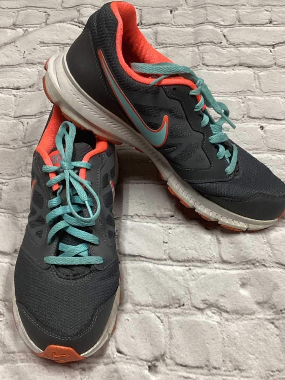 Nike Coral and Gray Running Shoe Interior Label